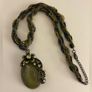 Necklace: iridescent Peacock seed bead “chain”, olive crystals art glass pendant